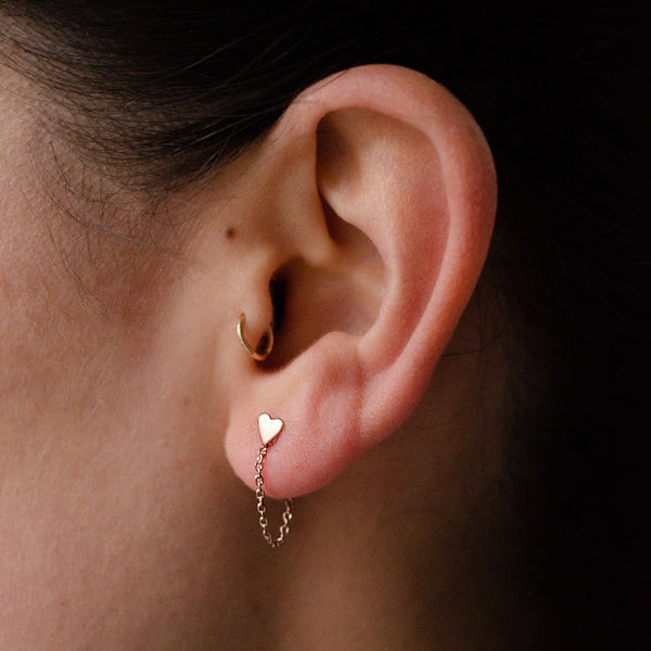 Two stud earrings discount